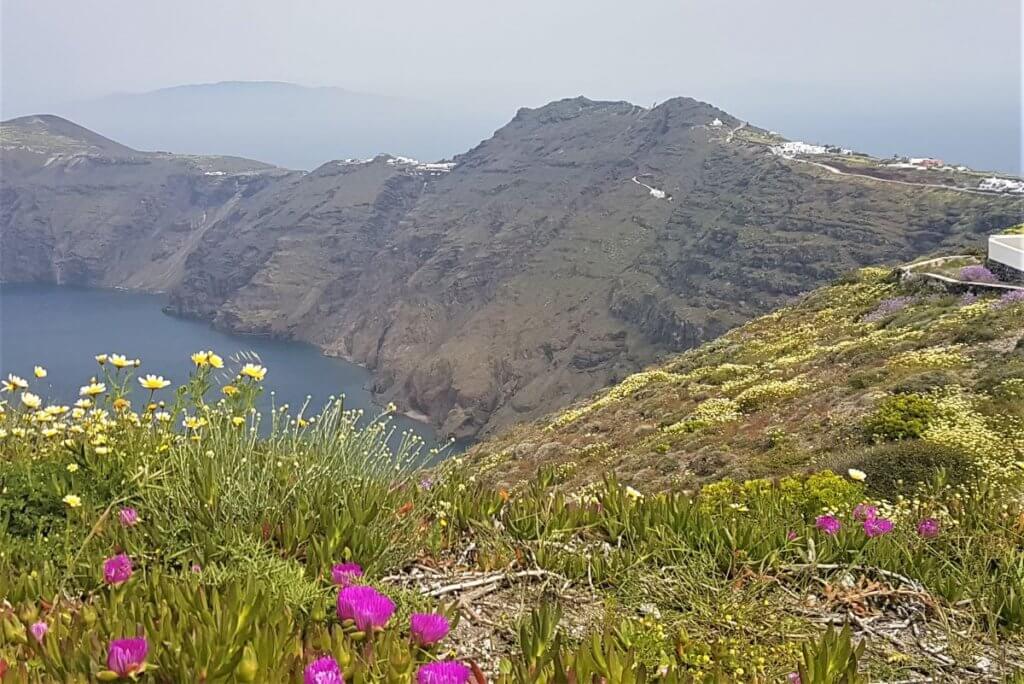 View across caldera on hike from fira to oia in Santorini