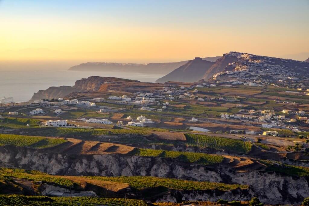 Landscape view of fields, vineyards and Santorini wineries, greece