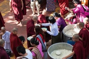 monks being fed in myanmar