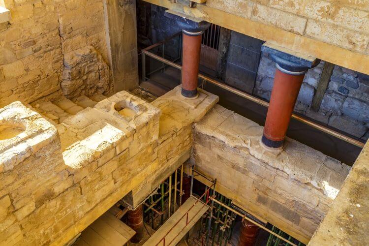 Photo taken looking down towards the mythical Minotaur labyrinth into the lower floors of the Palace with scaffolding propping up the floors