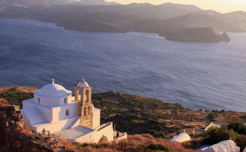 Photo of the Greek church view from Plaka castle in Milos island, Cyclades, Greece
