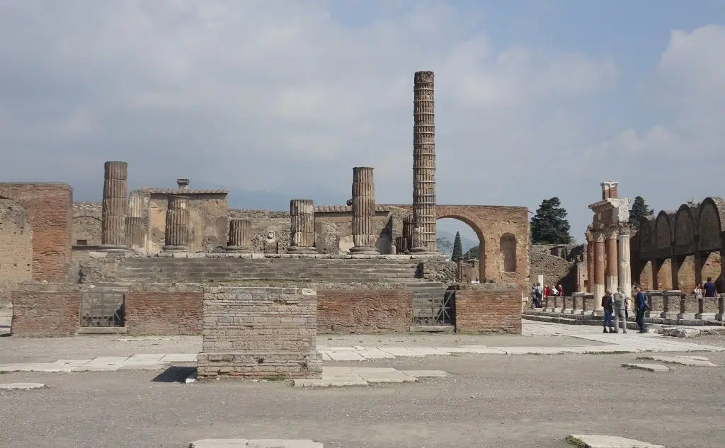 Photo of the Temple of Jupiter, Forum, Pompeii, with Vesuvius in the background