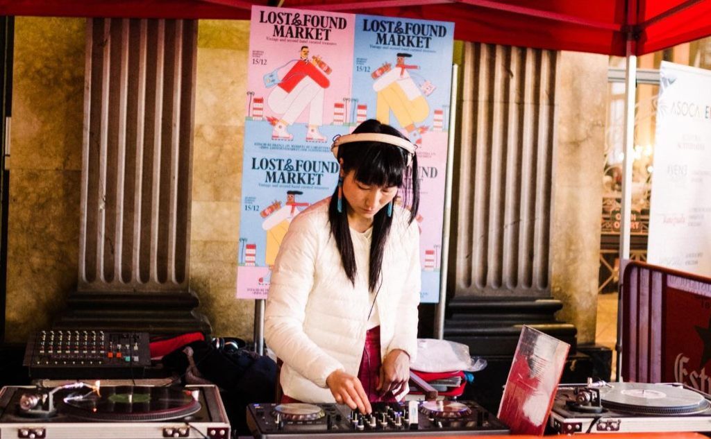 DJ playing music at the Lost and Found Market, Barcelona, Spain