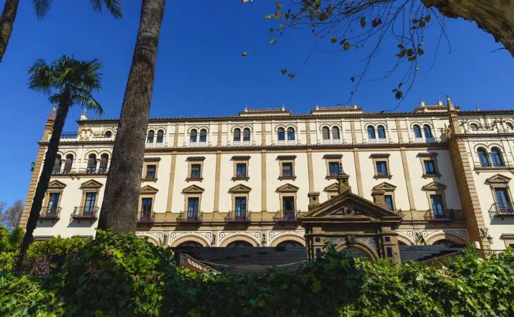 The Hotel Alfonso XIII building surrounded by trees