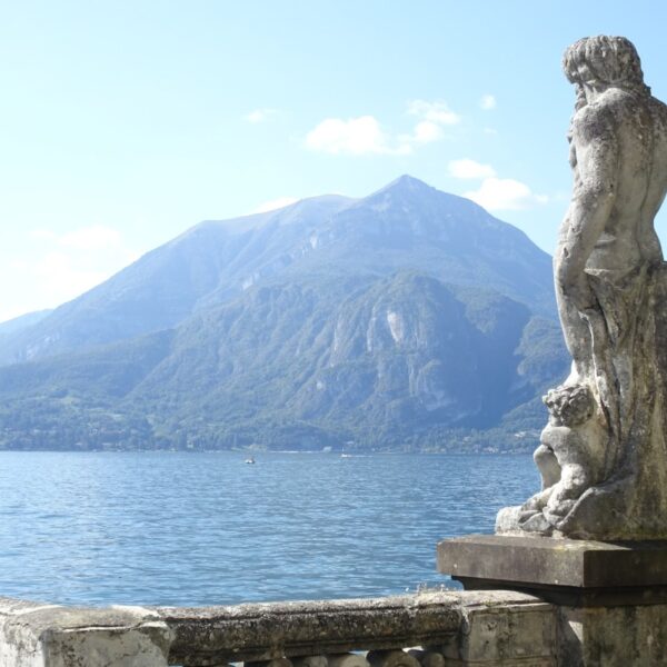 A statue overlooking Lake Como in Italy